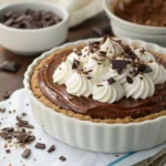 Rock Bottom Pie topped with whipped cream and chocolate