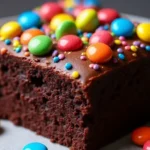 cosmic brownie cake with rainbow candy bits
