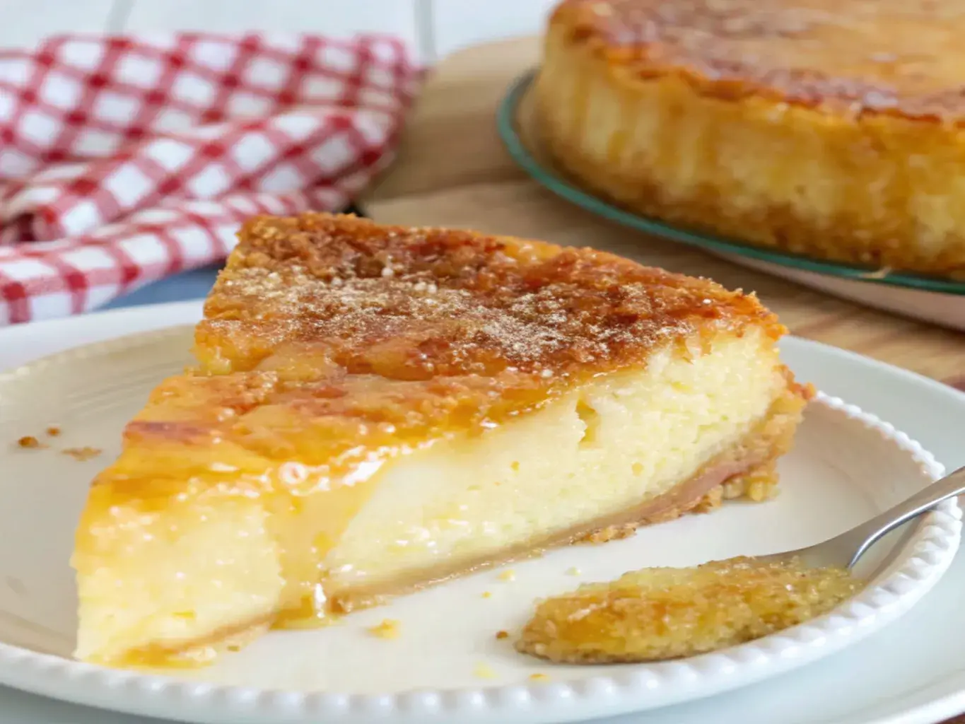 slice of crustless keto custard pie on a white plate
