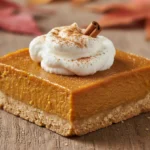 The ultimate easy fall dessert: Gluten-Free Pumpkin Pie Bars with a creamy filling and shortbread crust.