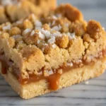 Easy Salted Caramel Butter Bars on a marble slab.
