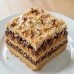 perfect-square-of-gooey-7-layer-bars (1)